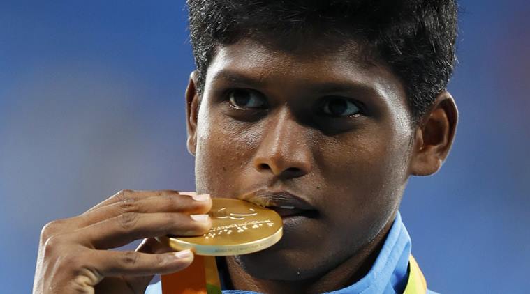 2016 Rio Paralympics - Men's High Jump - T42 Final - Olympic Stadium - Rio de Janeiro, Brazil - 09/09/2016. Mariyappan Thangavelu of India celebrates with his gold medal during the victory ceremony. REUTERS/Jason Cairnduff FOR EDITORIAL USE ONLY. NOT FOR SALE FOR MARKETING OR ADVERTISING CAMPAIGNS.