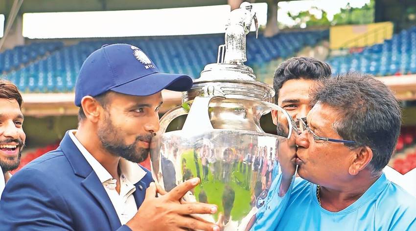 MP coach Chandrakant Pandit and captain Aditya Shrivastava on Sunday1